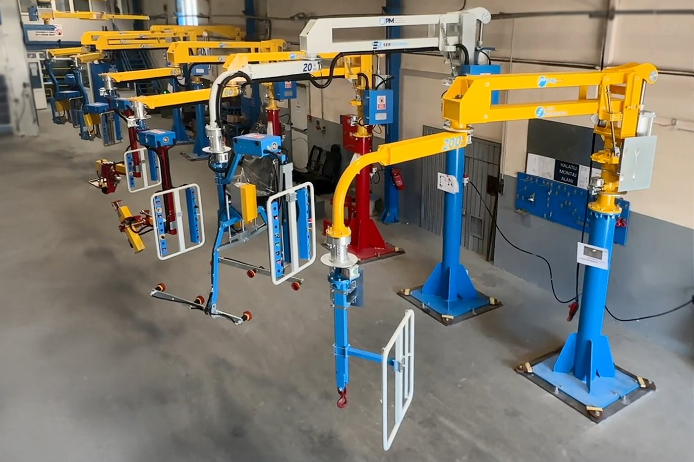 Pneumatic manipulator system eliminating manual material handling injury risks on manufacturing floor