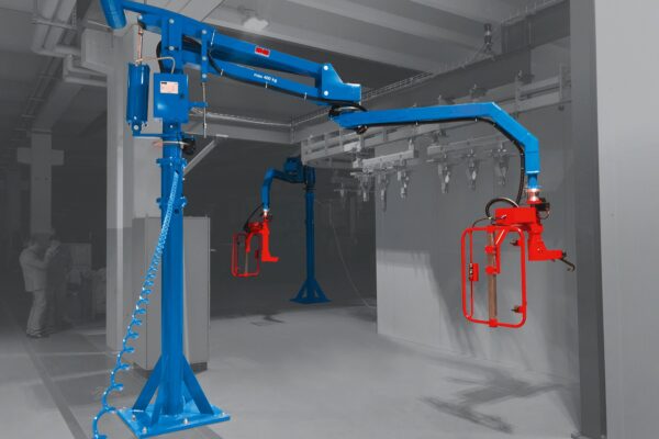 Industrial worker utilizing zero gravity lifting manufacturing ergonomics to move heavy components with a pneumatic manipulator