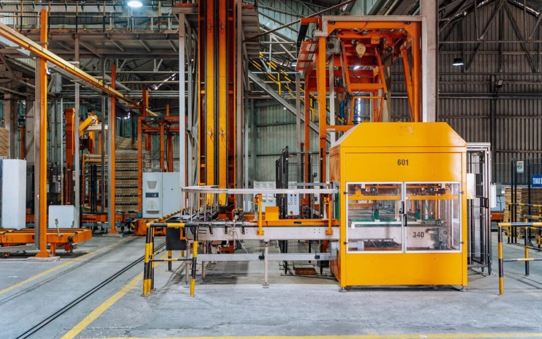 Automated packaging equipment on a warehouse production floor